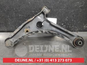 Mitsubishi Colt Front lower wishbone, right O606975 photo 2