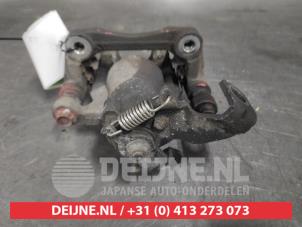 Hyundai Veloster Rear brake calliper, left O607462 photo 2