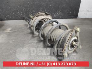 Nissan X-Trail Front shock absorber rod, left O607804 photo 2