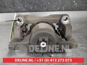 Nissan X-Trail Front brake calliper, left O607806 photo 2