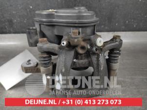 Nissan X-Trail Rear brake calliper, left O607807 photo 3