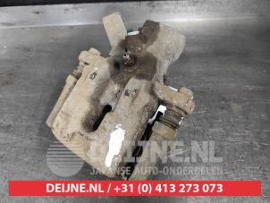 Suzuki Swift Bremszange links hinten O608159 foto 2