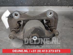 Kia Sportage Bremszange links vorne O608554 foto 2