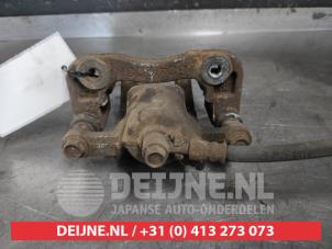 Hyundai Tucson Bremszange links hinten O608618 foto 2