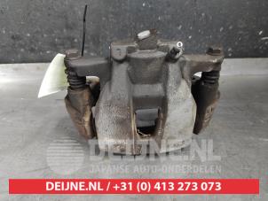 Toyota Avensis Verso Bremszange links vorne O609211 foto 3
