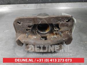 Toyota Avensis Verso Bremszange links vorne O609211 foto 2
