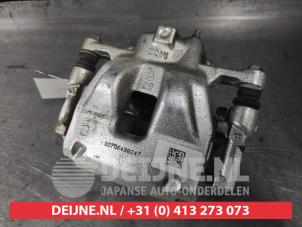 Toyota Yaris Cross Front brake calliper, left O609470 photo 2