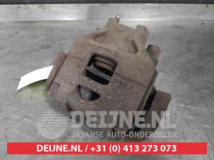 Toyota Yaris Front brake calliper, right O609565 photo 2