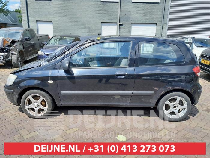 Hyundai Getz Türscheibe 2-türig links O609641