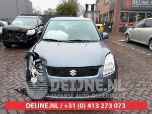 Suzuki Swift Bumper Rooster O610321 foto 3