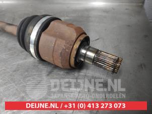 Hyundai IX35 Aandrijfas links-voor O610975 foto 3