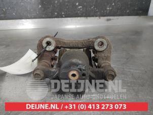 Hyundai IX35 Rear brake calliper, right O610993 photo 2