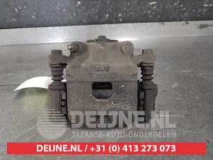 Daihatsu Sirion Front brake calliper, right O611029 photo 3