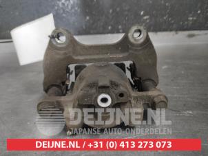 Daihatsu Sirion Front brake calliper, right O611029 photo 2