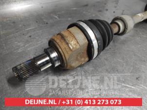 Hyundai IX20 Aandrijfas links-voor O612342 foto 2