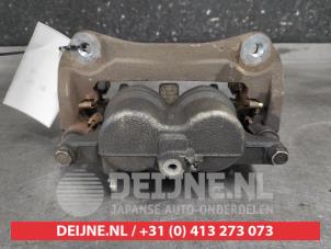 Toyota Rav-4 Bremszange rechts vorne O612749 foto 2