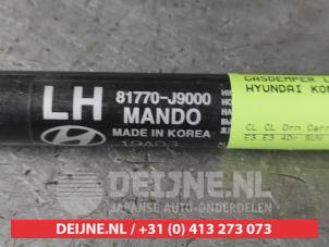 Hyundai Kona Rear gas strut, left O613049 photo 2