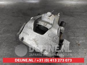 Toyota Yaris Bremszange links vorne O613433 foto 2