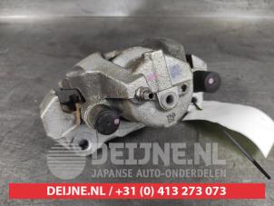 Toyota Yaris Bremszange links vorne O613433 foto 3