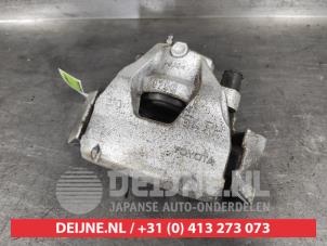 Toyota Yaris Front brake calliper, right O613434 photo 2