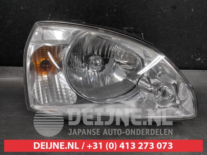 Kia Carens Koplamp rechts O614122