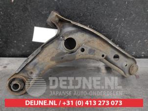 Toyota Yaris Front lower wishbone, left O614623 photo 2
