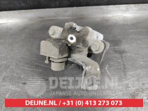 Suzuki SX-4 Bremszange links hinten O614815 foto 3