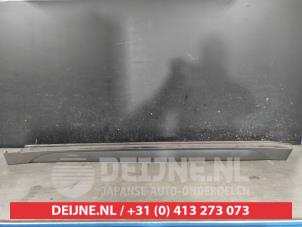 Hyundai Tucson Zijskirt links O615335 foto 2