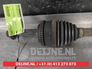 Kia Venga Aandrijfas rechts-voor O615481 foto 2