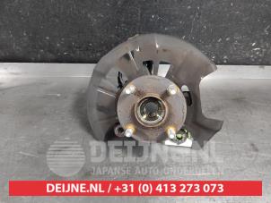 Mazda 2 Achsschenkel links vorne O616337 foto 2
