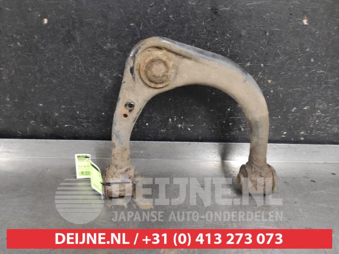 Toyota Hilux Draagarm Boven links-voor O616932