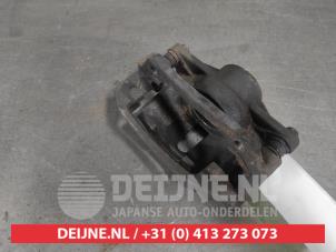 Toyota Yaris Front brake calliper, left O617817 photo 2