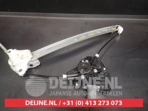 Toyota Yaris Window mechanism 4-door, front left O617861 photo 2