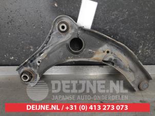 Nissan Micra Front lower wishbone, left O618500 photo 2