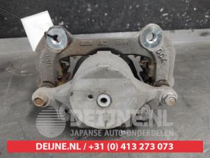 Hyundai Kona Bremszange links vorne O618668 foto 2