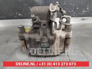 Toyota Yaris Rear brake calliper, left O618776 photo 3