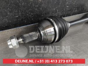 Nissan Note Aandrijfas links-voor O9990008970 foto 2