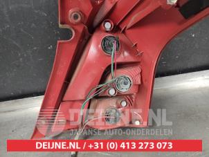 Suzuki Swift Rücklicht links O619329 foto 2