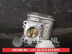 Nissan Micra Drosselklappengehäuse O619492 foto 2