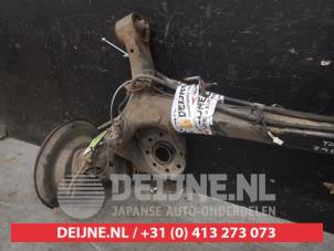 Toyota Verso-S Rear-wheel drive axle O619972 photo 2
