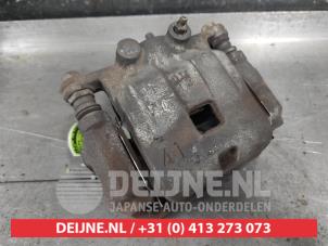 Suzuki Swift Bremszange links vorne O620567 foto 2