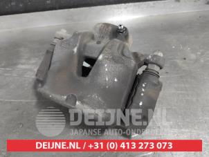 Hyundai Tucson Bremszange links vorne O620839 foto 2