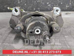 Toyota Yaris Front brake calliper, left O622189 photo 2