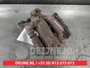 Kia Venga Bremszange links hinten O622606 foto 2