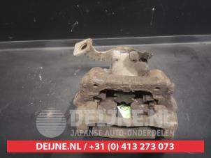 Toyota Auris Rear brake calliper, left O623107 photo 2
