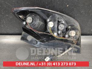 Ssang Yong Korando Achterlicht links O623859 foto 2