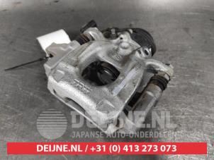 Nissan Qashqai Bremszange links hinten O624016 foto 2
