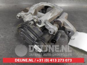 Nissan Qashqai Bremszange links hinten O624016 foto 3