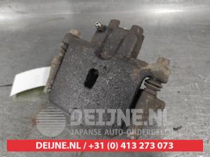 Mitsubishi Pajero Bremszange links hinten O624086 foto 2