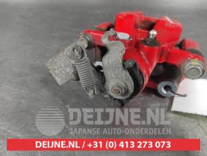 Hyundai I20 Bremszange links hinten O624357 foto 3